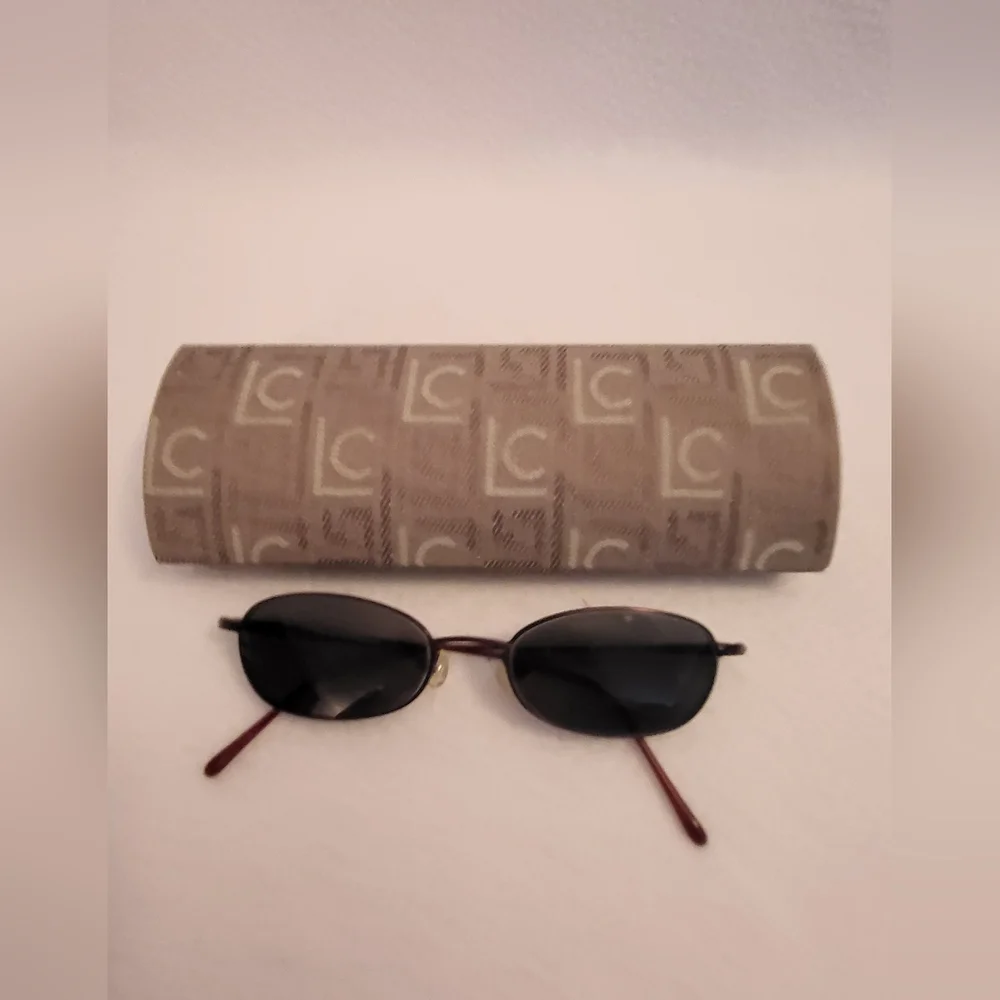 Covergirl wire frame eye glasses,  vintage wine color